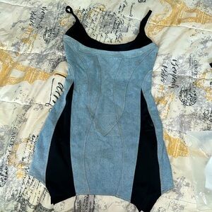 Very cute mini dress. Brand new, never worn. Too small